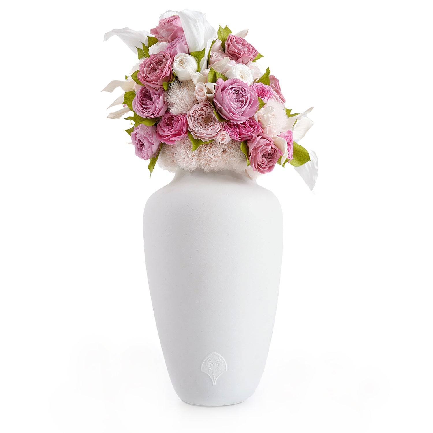 White ceramic vase with a bouquet of pink and white roses and calla lilies