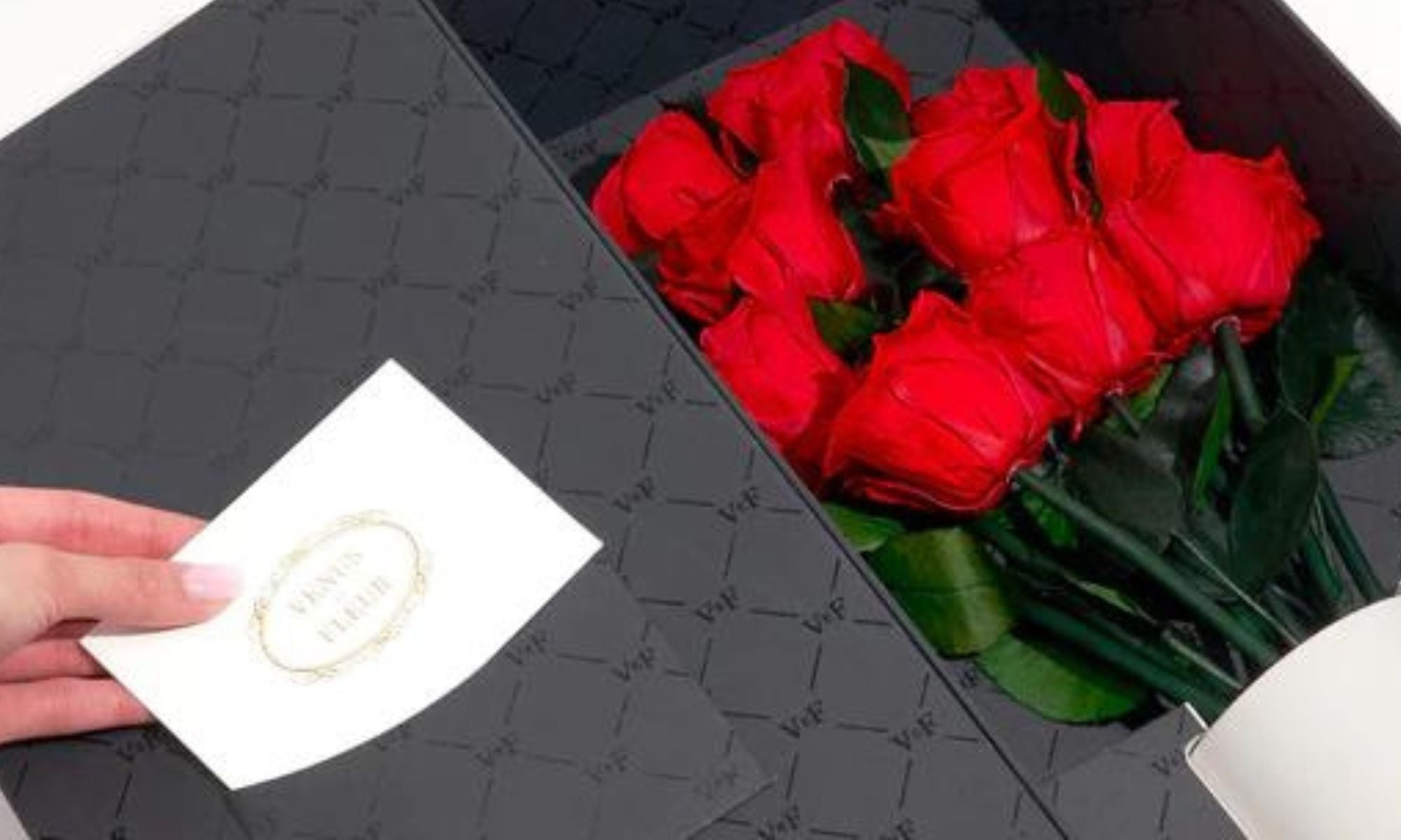 A Dozen Red Roses in Le Douze Arrangement With Card