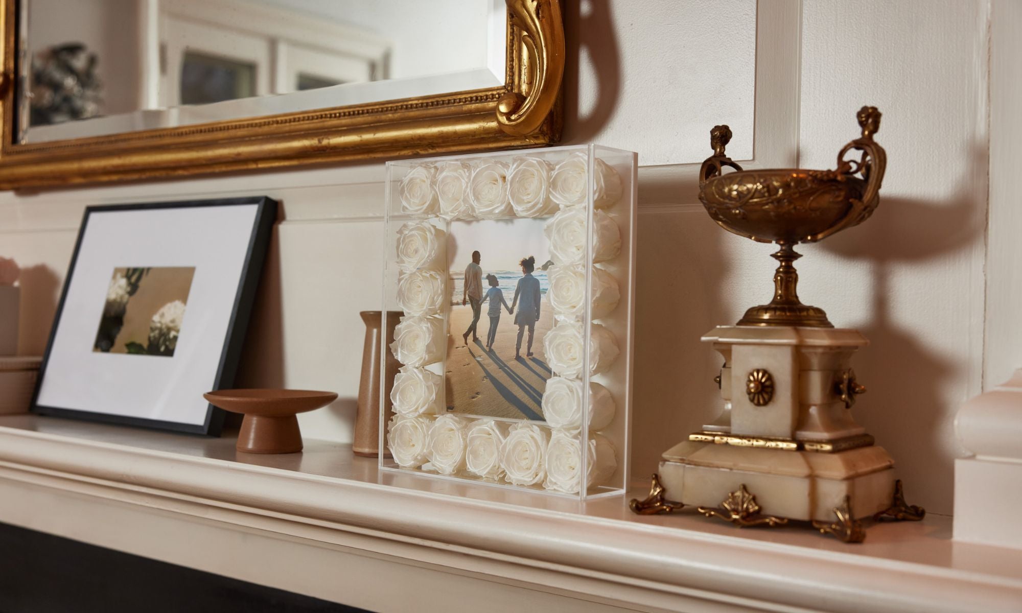 The Fleur Frame With Pearl Sheen Roses as Mantle Decor