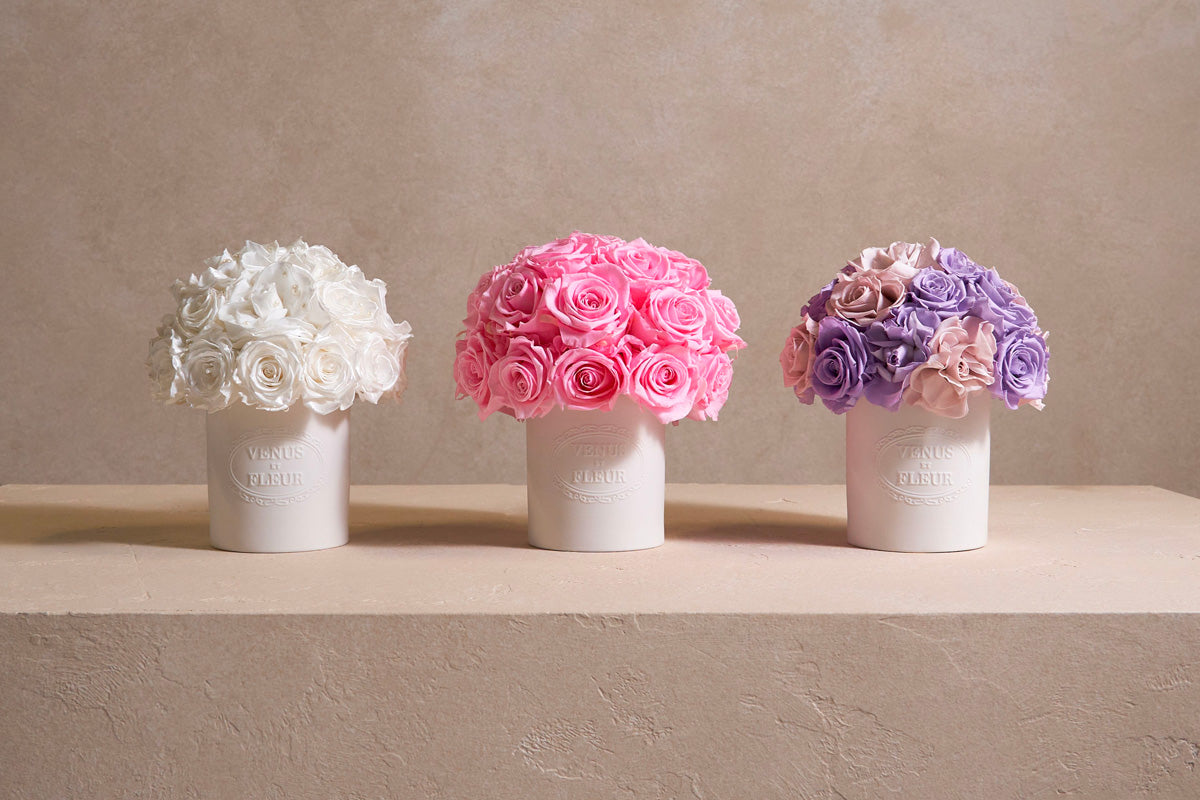 Fleura Porcelain Vases with various floral arrangements by Venus et Fleur