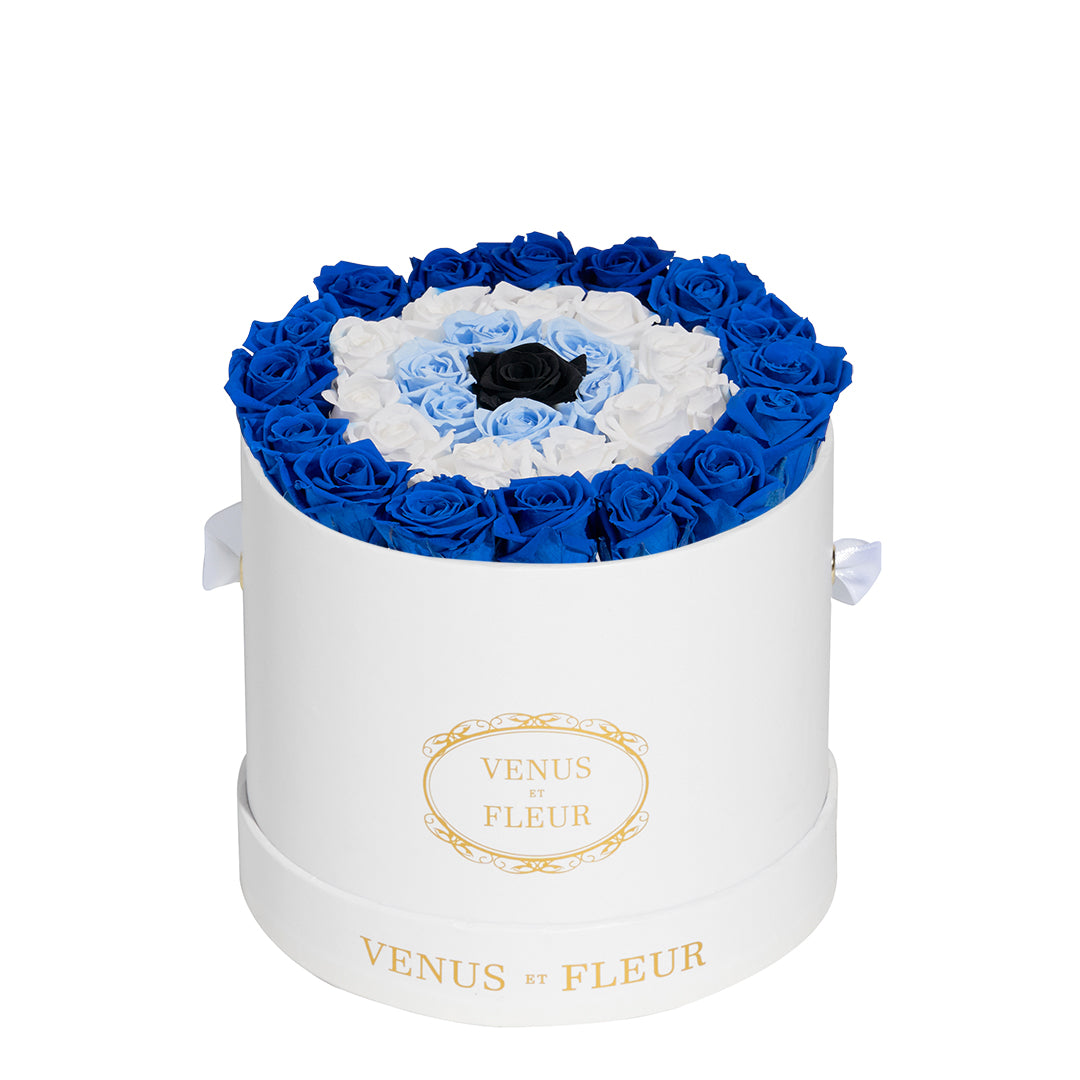 Deep Blue, Baby Blue, White Eternity Roses in A Evil Eye Symbol in Le Petit Round Box White Signature Classic Box